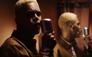 Hiran: o rap pode ser gay? Hiran vira as costas para o espelho no videoclipe de "Safadin Goxtosin" (2024), com participação de RDD, do grupo Àttøøxxá – foto reprodução YouTube