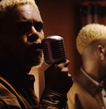 Hiran: o rap pode ser gay? Hiran vira as costas para o espelho no videoclipe de "Safadin Goxtosin" (2024), com participação de RDD, do grupo Àttøøxxá – foto reprodução YouTube
